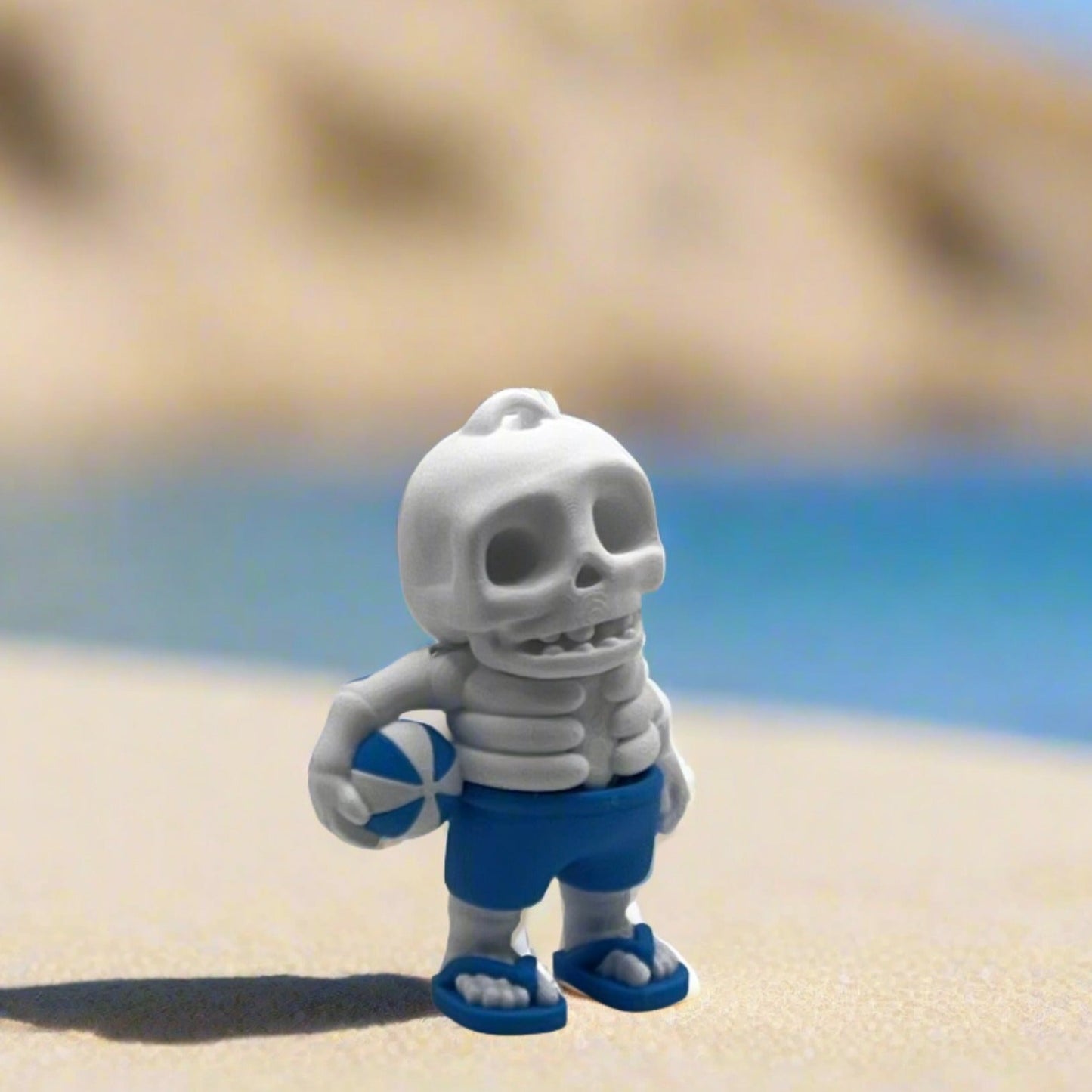 Beach Bones Buddies - white, blue, beach ball, keychain.